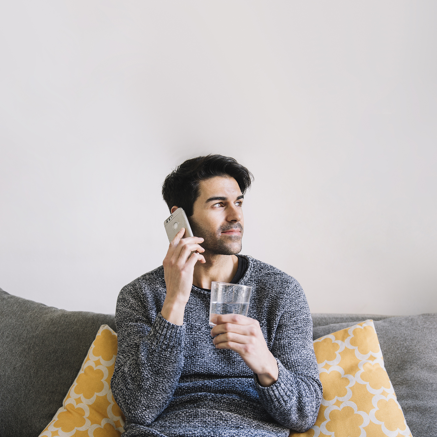 man-with-water-speaking-phone
